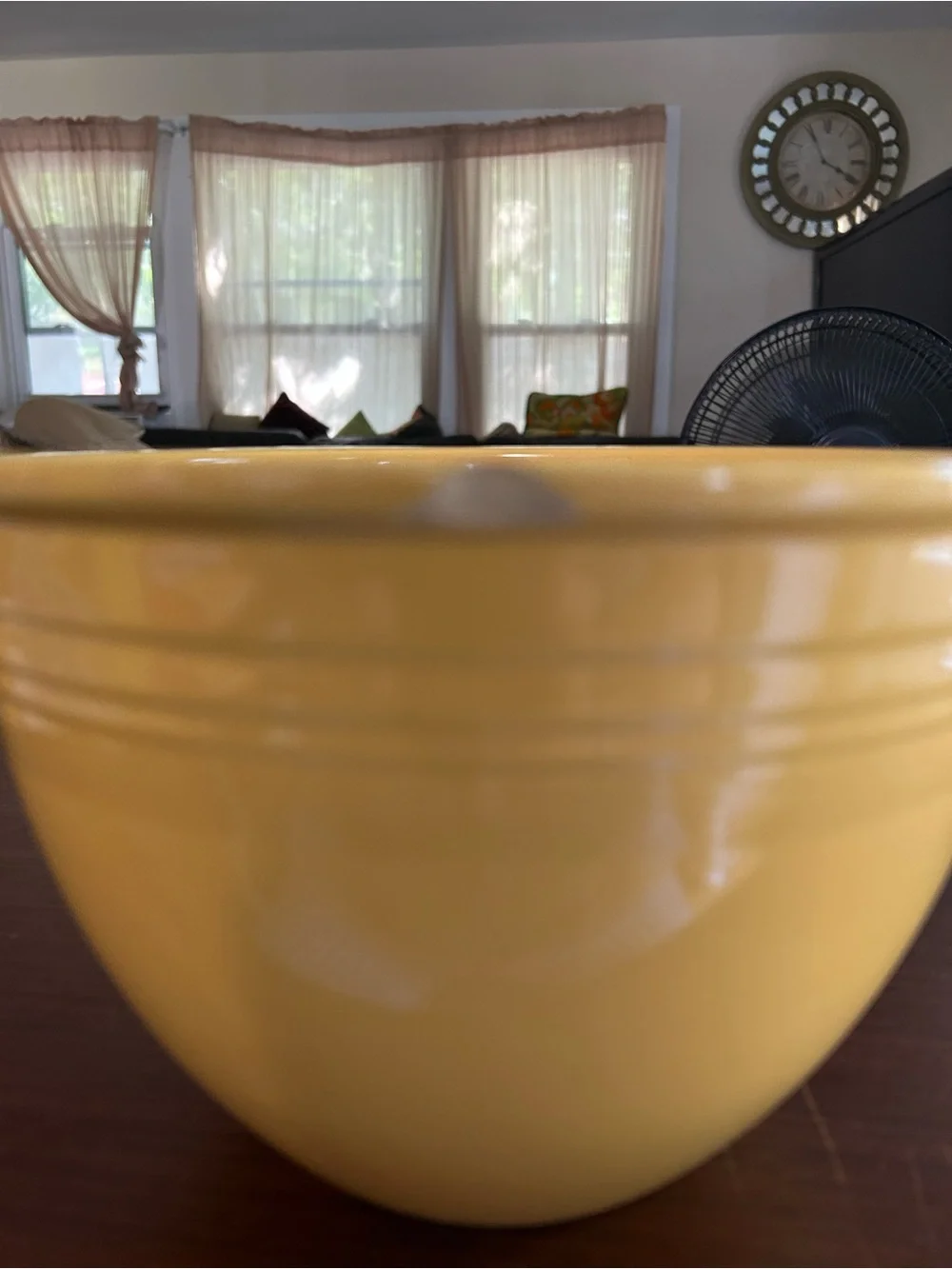 Vintage fiestaware yellow mixing bowl two chips on the rim, 8 3/4”wide x 6 1/2”